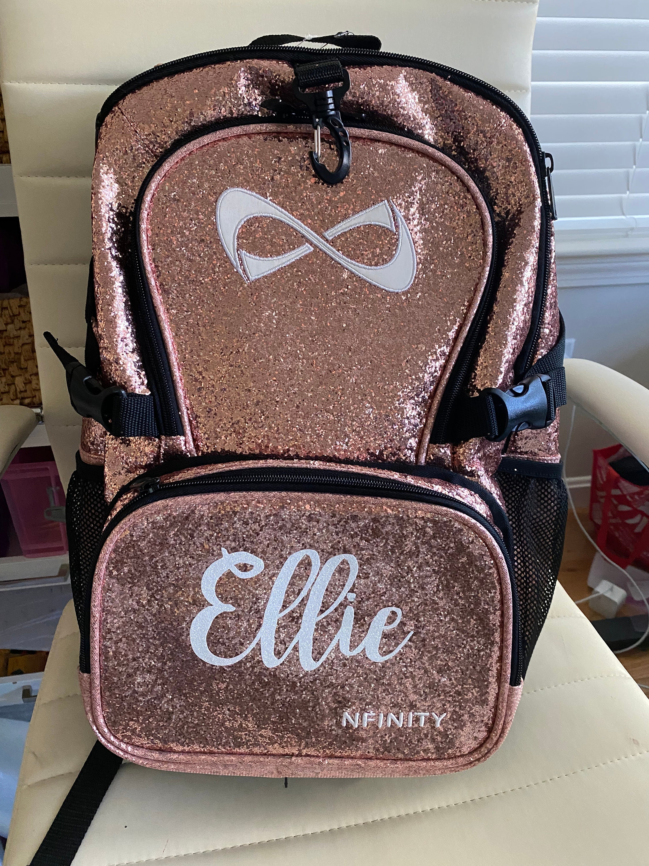 Nfinity rose 2024 gold backpack