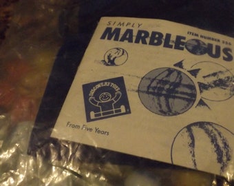 Marbleous Bag of Marbles with original blue velvet bag never opened retro toys