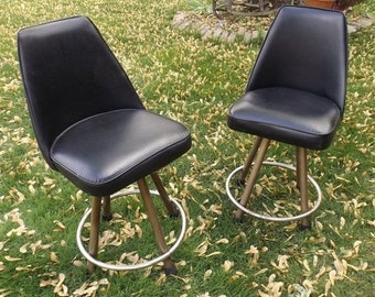 Pair of mid century black pleather swivel bar stool chairs low height man cave breakfast bar