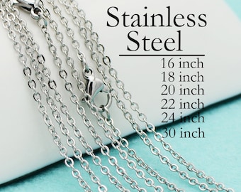 Stainless Steel Polished Cross w/Crystal Two Bead Chain Necklace Length 16 Width Stainless Steel Polished Cross w/Crystal Two Bead Chain Necklace Length 16 Width