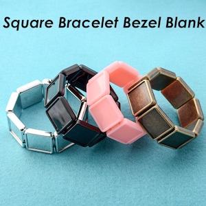 May include: Three square bracelet bezel blanks in different colors: silver, black, and pink. The bezels are made of metal and have a square shape. The bracelets are stacked on top of each other.