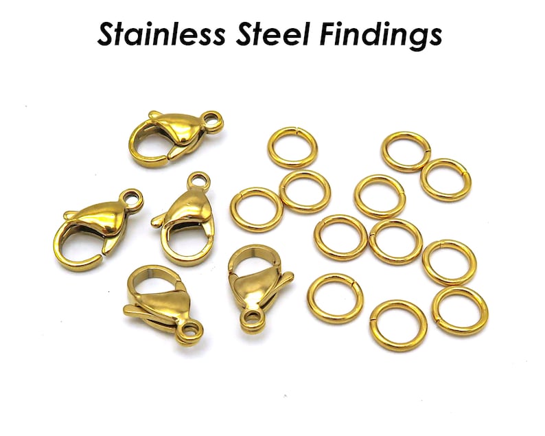 May include: A collection of gold-toned stainless steel findings for jewelry making. The set includes lobster clasps and jump rings.