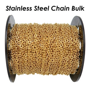 May include: A spool of gold-colored stainless steel chain. The chain is wound around a black plastic spool.