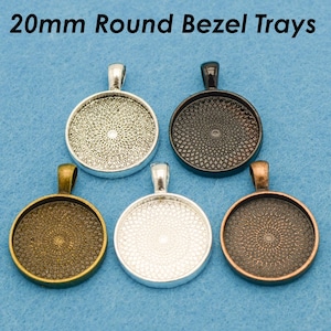 May include: Five 20mm round bezel trays in silver, gold, copper, and black. The trays are designed for jewelry making and crafting.