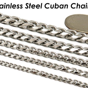 May include: Four different sizes of stainless steel Cuban chains, laid out in a row. The chains are all silver in colour and have a shiny finish. A UK 20 pence coin is included for size reference.