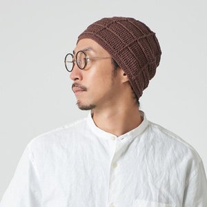 Japanese male wearing a year-round sumer winter brown block crochet slouchy beanie for men and women