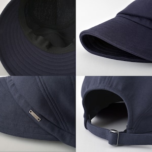 Puede incluir: Una gorra de b&eacute;isbol azul marino con una visera curvada y un peque&ntilde;o logotipo met&aacute;lico que dice "Chrome" en la parte delantera. La gorra tiene una correa trasera con una hebilla met&aacute;lica.