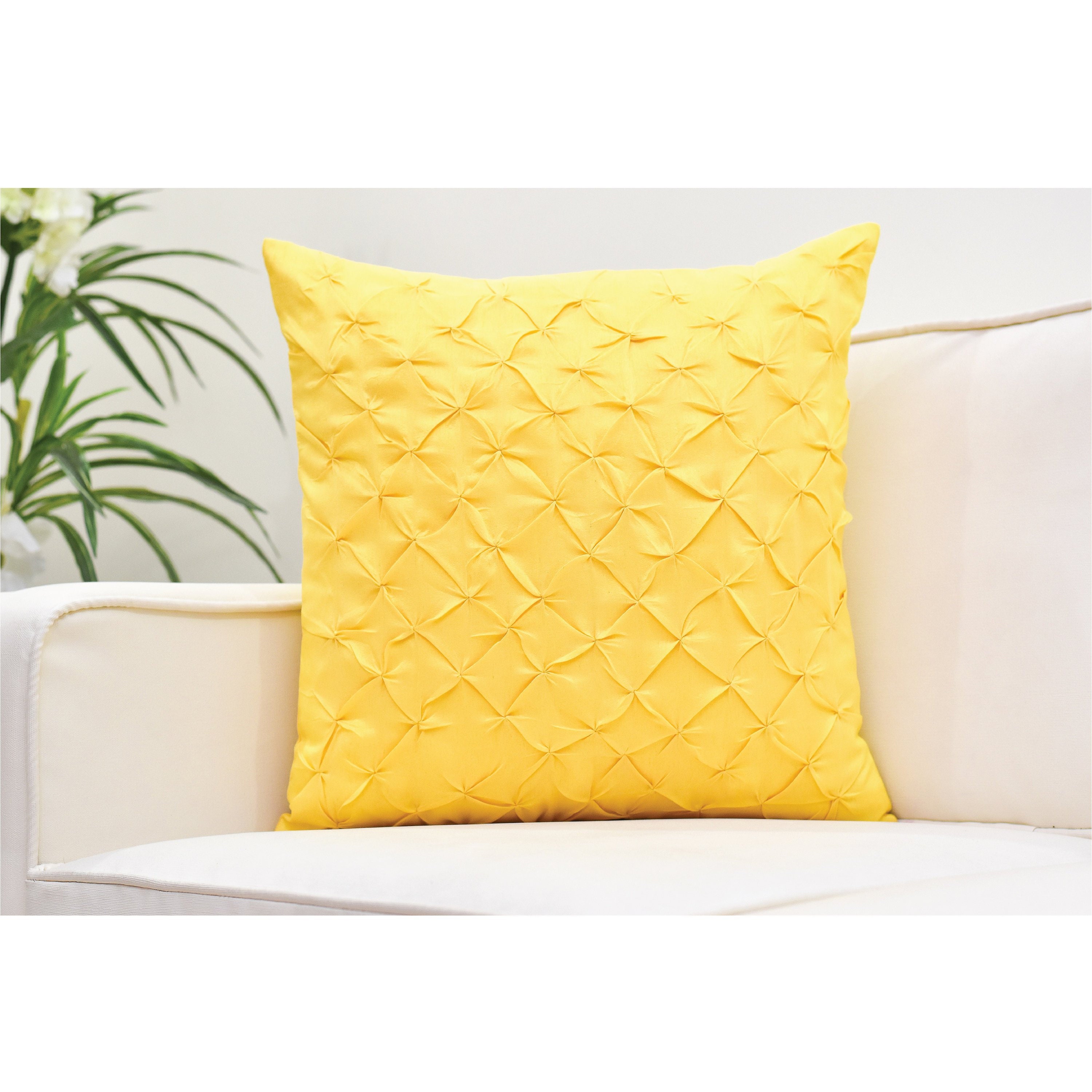 yellow textured throw pillow