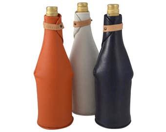 White handmade luxury bottle jacket, sleeve in leather with neoprene inner lining to keep your wine or champagne cool and safe