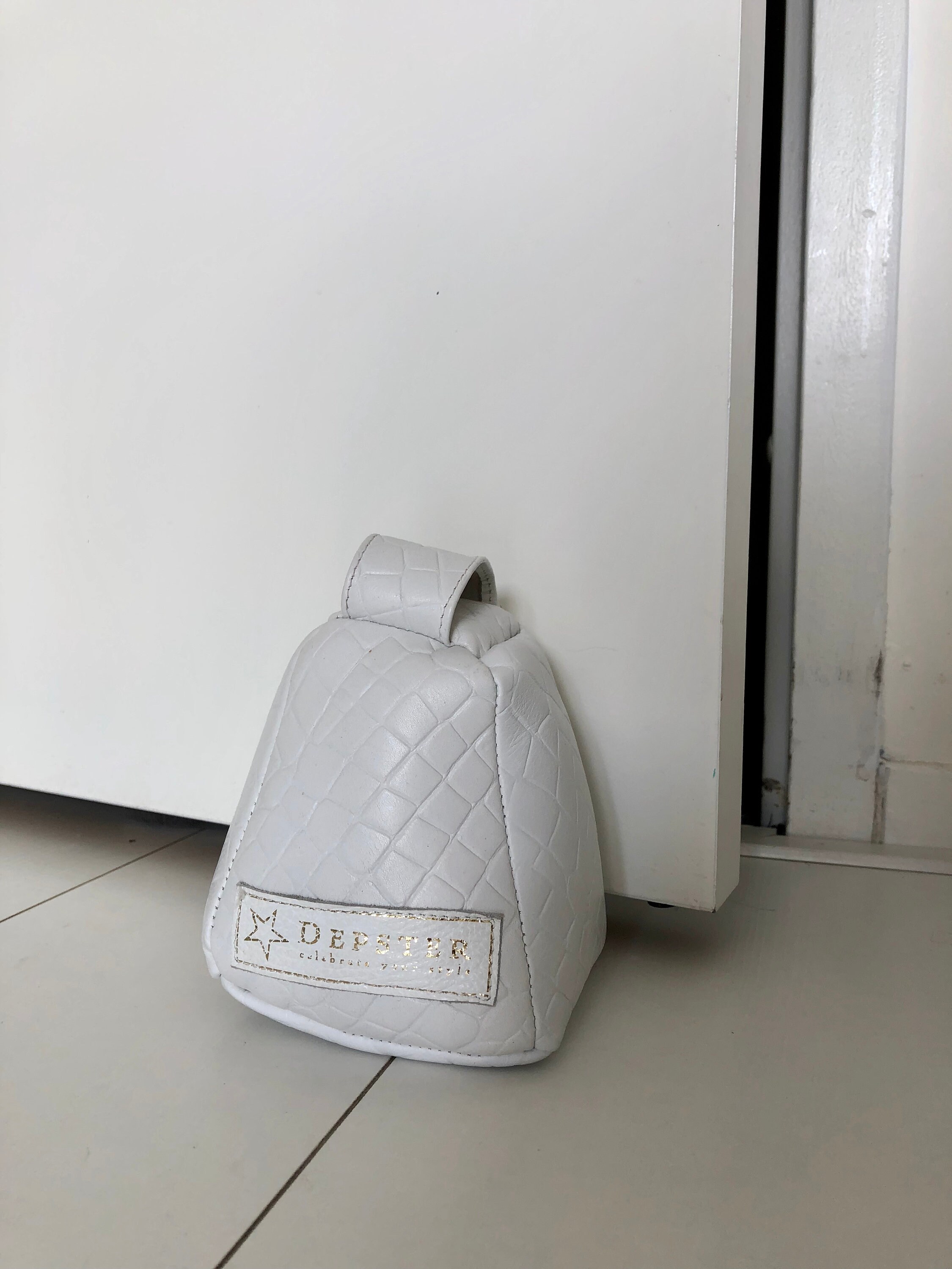 Hand Made Luxury Door Stop in Black Coloured Leather, Made Out of