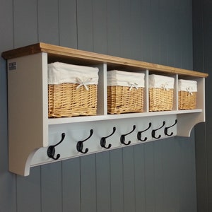 Painted or wood finished hat & coat rack with shelf including baskets,