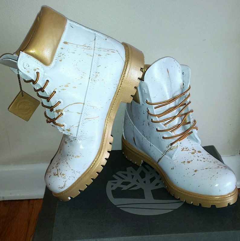 white and gold timberlands