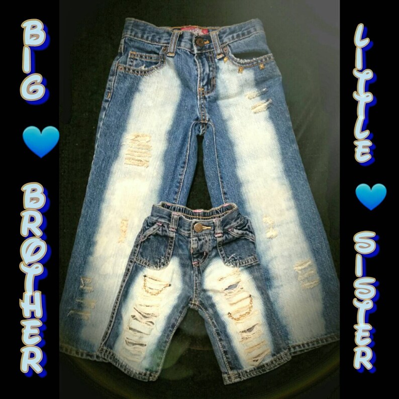 ripped jeans with chains