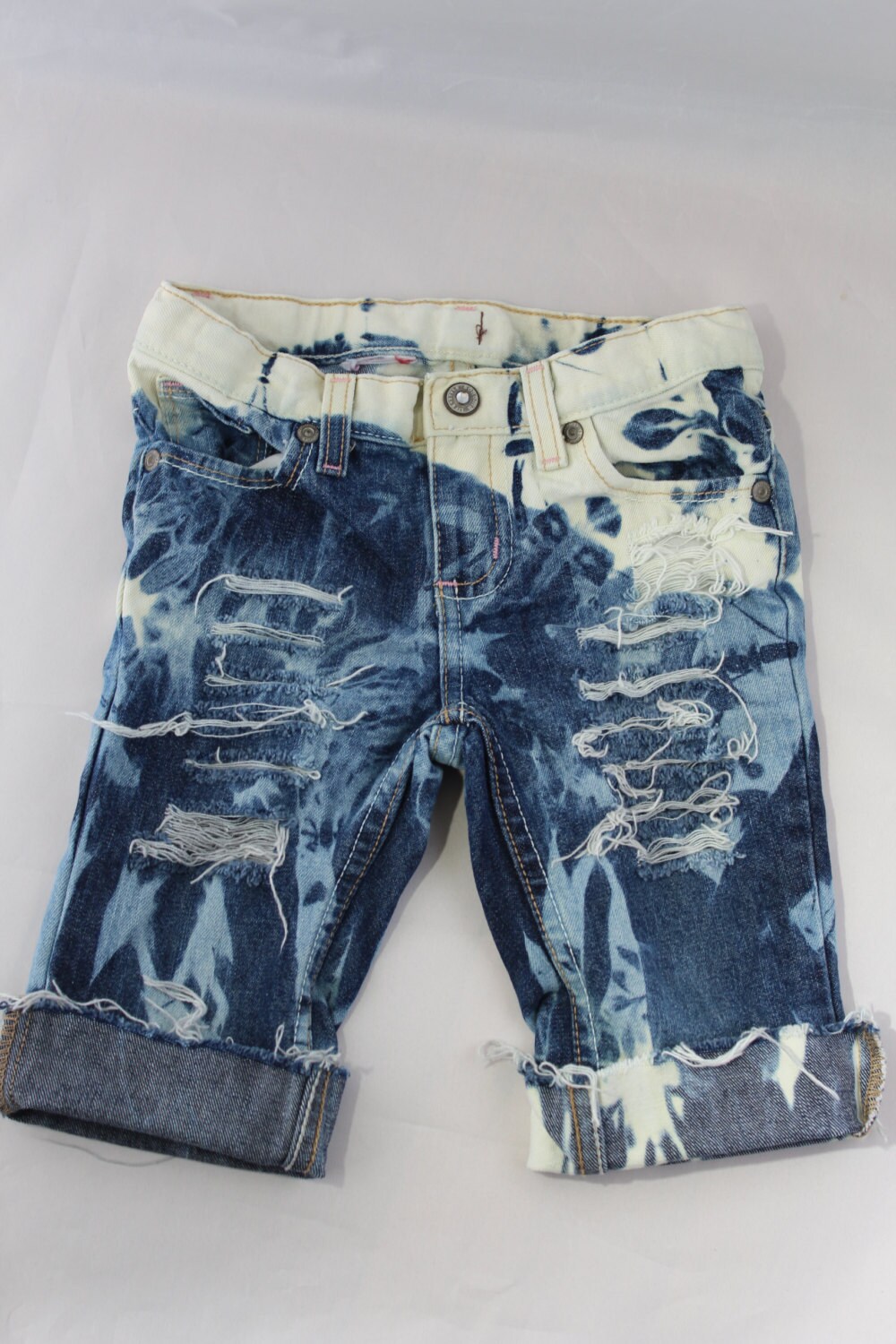 distressed jeans with chains