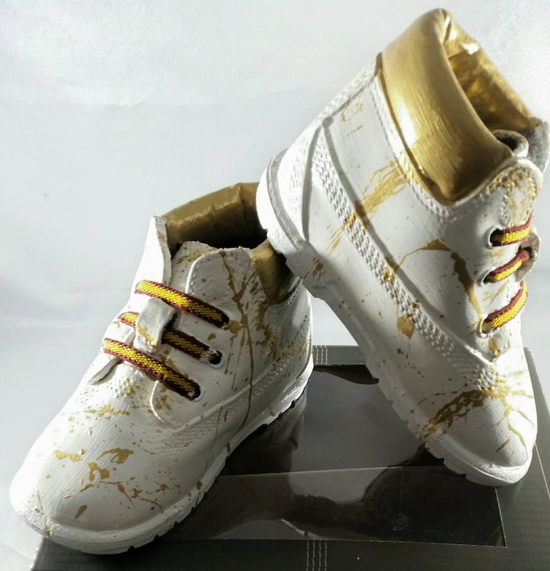 white and gold timberlands