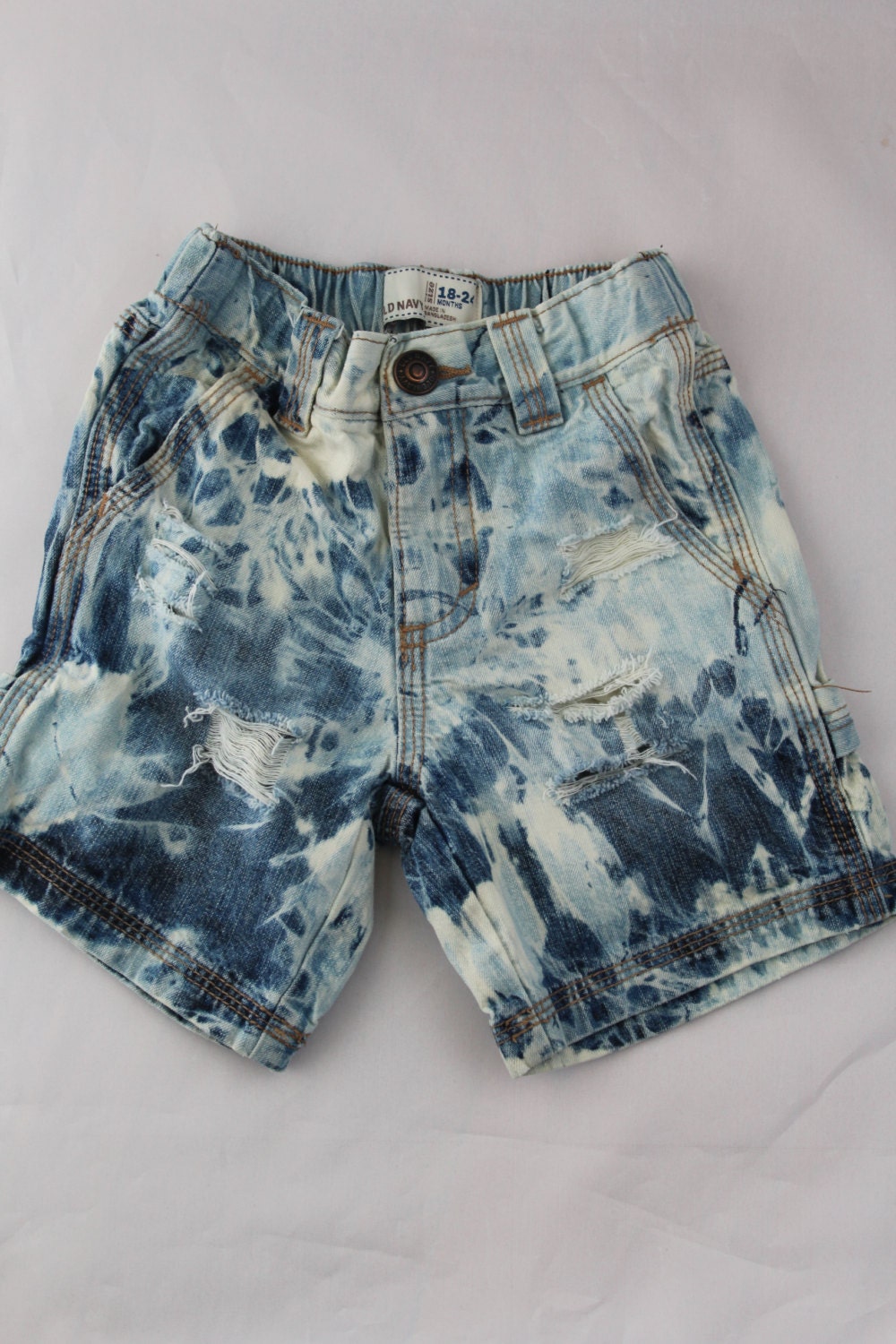 distressed jeans with chains
