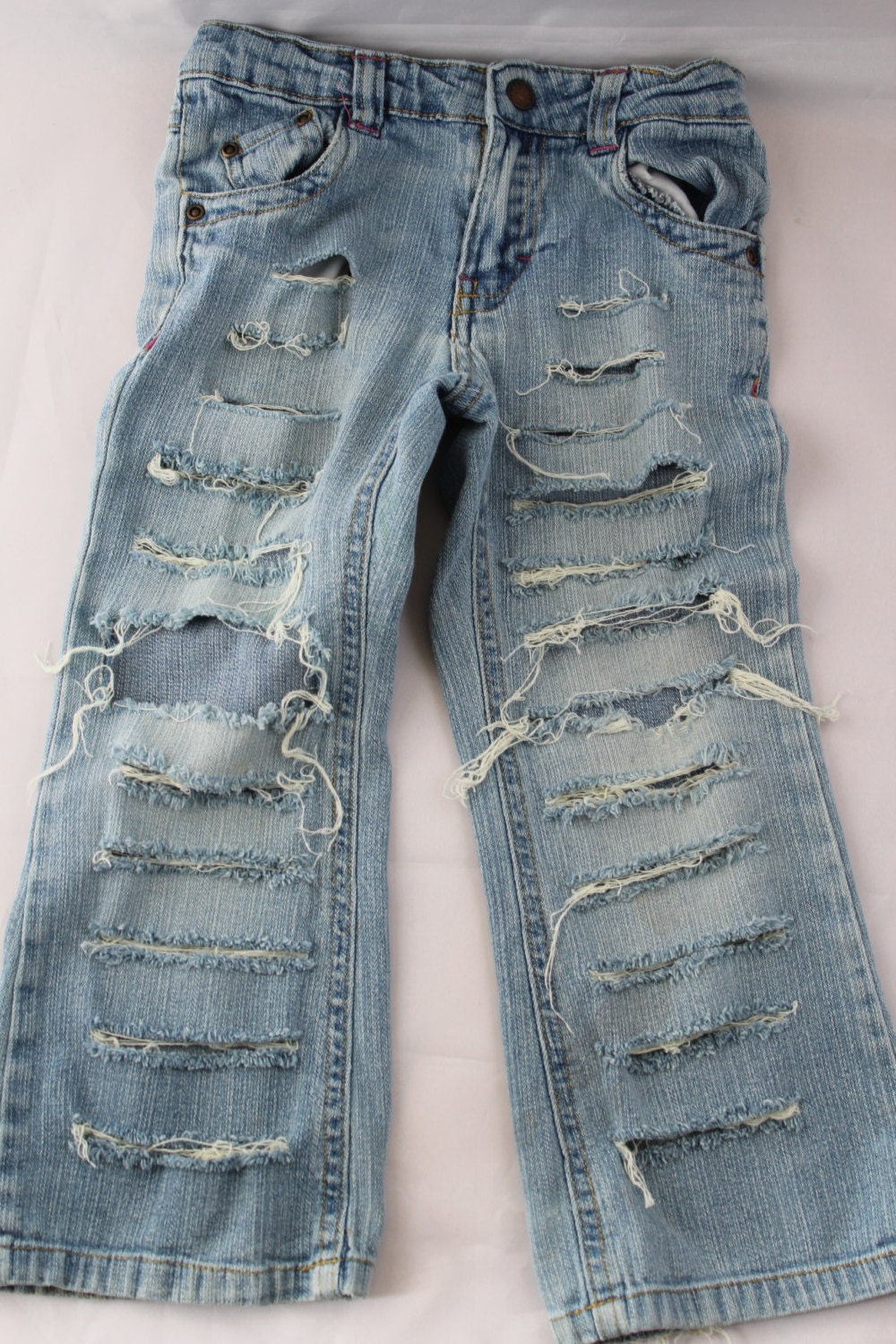 distressed jeans with chains