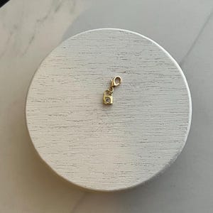 18K guldberlock - Litet lås 8 mm