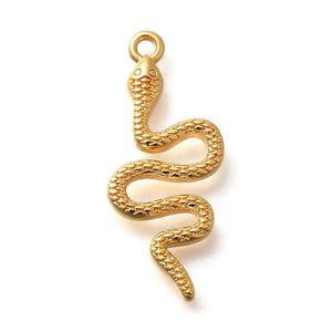 May include: Gold-colored snake charm with a textured surface. The charm has a loop at the top for attaching to jewelry. The snake is in a curved, slithering pose, with a detailed head and body.