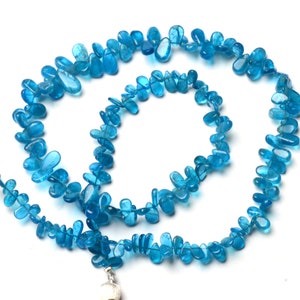 natural gemstone, neon blue apatite, 6x4 to 7x5 mm size pear beads, 18 inch full strand