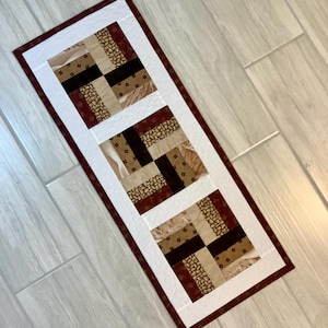 Quilted Table Runner: Browns and Tans in a  modern four square patchwork design