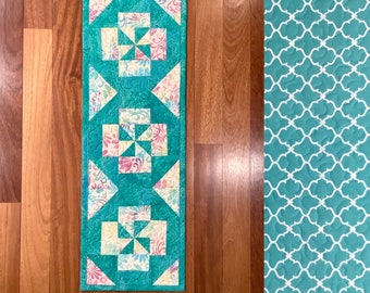 Modern batik quilted pinwheel table runner. 11” x 31”.  Reversible.  Table topper. Free shipping