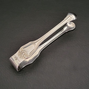 Christofle Sugar tongs Pair of silver plated sugar tongs threads and shells pattern vintage Made in France