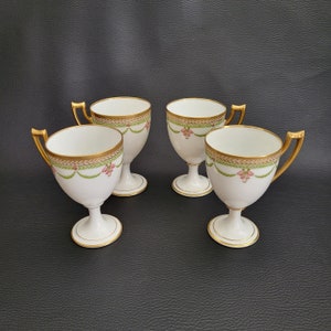 4 footed coffee cups white porcelain gilded frieze and handle green garlands vintage Made in France