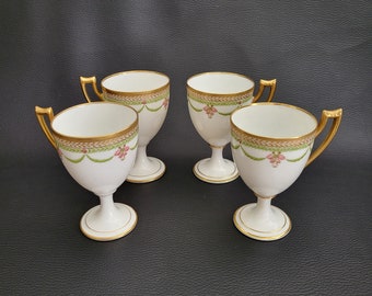 4 footed coffee cups white porcelain gilded frieze and handle green garlands vintage Made in France