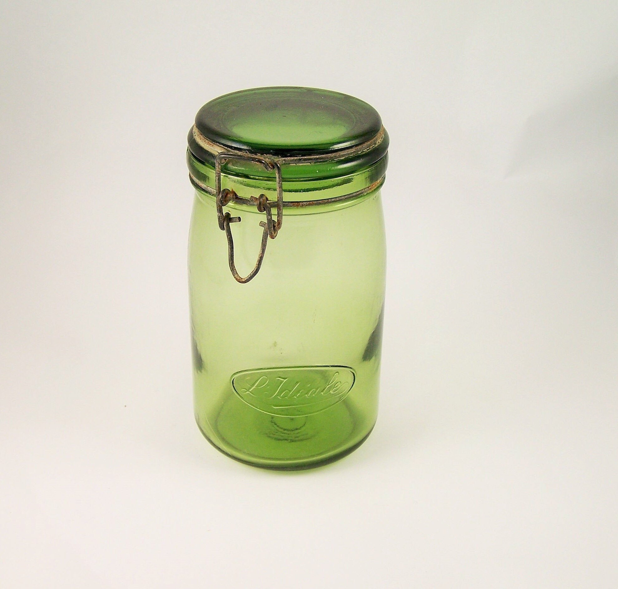 Bocal ancien en verre de couleur verte marque L'IDEALE 1