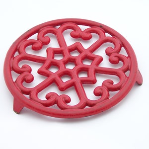 Round red cast iron trivet vintage  Shabby chic trivet