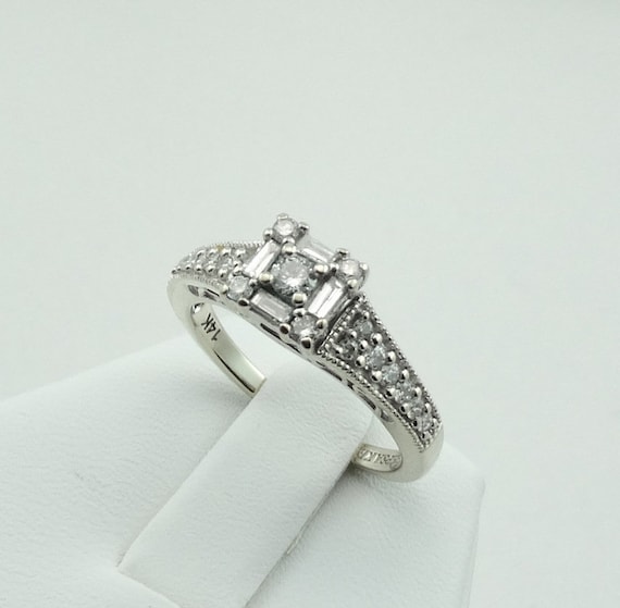 Delicate Diamonds and 14K White Gold Vintage Keepsake Engagement