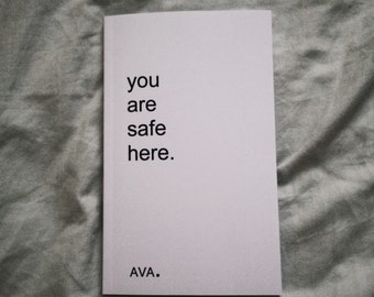 poetry book: you are safe here. by AVA.