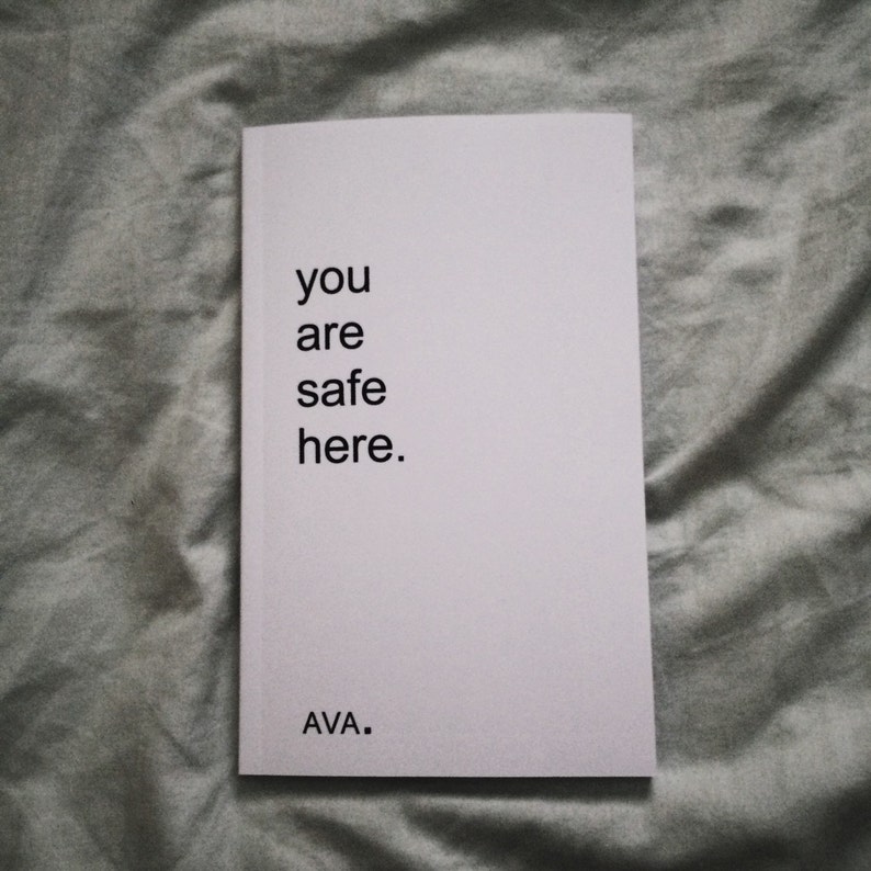 poetry book: you are safe here. by AVA. 