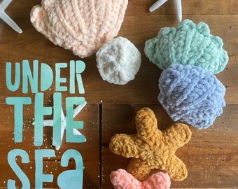 May include: Crochet pattern for "Under the Sea Treasures".  The pattern includes instructions for crocheting a variety of sea-themed items, including starfish and seashells in various colours.