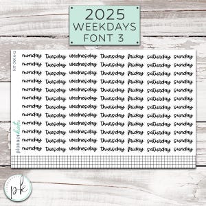 May include: A sticker sheet featuring rows of the days of the week written in a black cursive script. The text includes Monday, Tuesday, Wednesday, Thursday, Friday, Saturday, and Sunday. A grid pattern border runs along the bottom edge.