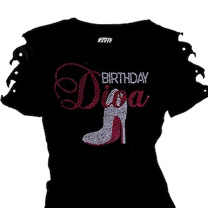 May include: Black t-shirt with a rhinestone design that says "Birthday Diva" with a high heel shoe graphic.