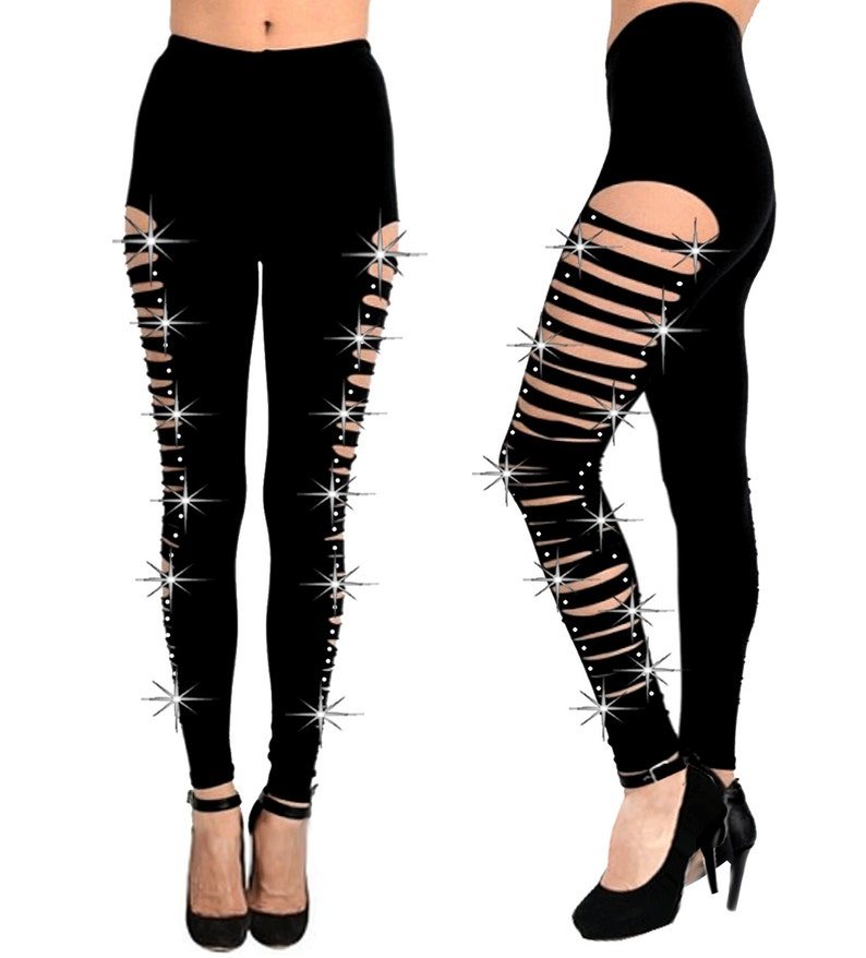 May include: Black leggings with multiple slits and rhinestone embellishments along the sides.