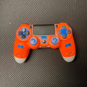 May include: A set of three ceramic mugs with a speckled, matte finish. The mugs are in shades of cream, light gray, and dark gray. Each mug has a simple, minimalist design and a rounded handle.