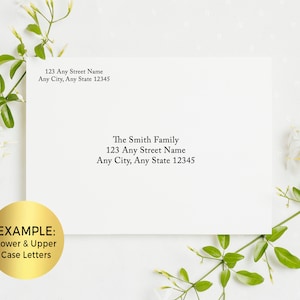 May include: A white envelope with a gold sticker that says "EXAMPLE: Lower & Upper Case Letters". The envelope has two addresses written on it: "123 Any Street Name, Any City, Any State 12345" and "The Smith Family, 123 Any Street Name, Any City, Any State 12345".