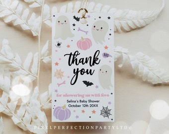 May include: A white thank you tag with a pink, purple, and orange pumpkin, ghosts, bats, and stars. The text reads "Thank you for showering us with love Selina's Baby Shower October 12th 20XX".