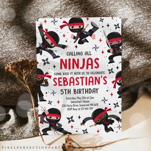 May include: A white birthday invitation with a red and black ninja theme. The invitation says "Calling all Ninjas" and "Come kick it with us to celebrate Sebastian's 5th Birthday". The invitation includes the date, time, location, and RSVP information.