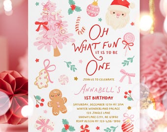 May include: A festive invitation with a pink Christmas tree, Santa Claus, and the text "Oh What Fun It Is To Be One." The invitation includes details for Annabell's 1st birthday party, with a winter wonderland theme.