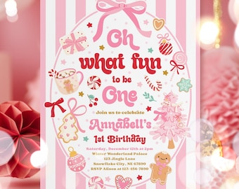 May include: A pink and white invitation for a first birthday party. The text "Oh what fun to be One" is in a playful font, surrounded by festive illustrations of gingerbread men, candy canes, and a Christmas tree. The invitation includes the name "Annabell's" and party details.