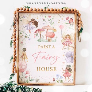 May include: A pink and gold sign with the text "Paint a Fairy House" surrounded by illustrations of fairies, flowers, and mushrooms.