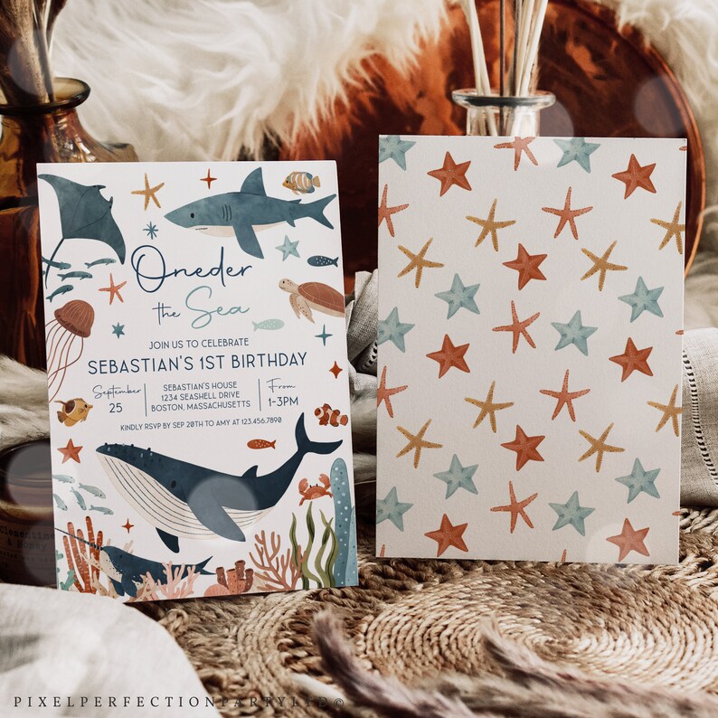 May include: A white invitation card with a blue and orange under the sea theme. The card features a whale, a shark, a stingray, a turtle, a jellyfish, and a crab. The text on the card reads "Oneder the Sea" and "Sebastian's 1st Birthday".