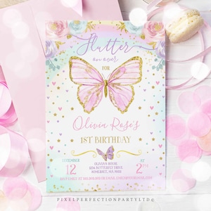 May include: A pastel blue and pink butterfly-themed first birthday party invitation with gold glitter accents. The invitation features a large pink butterfly with gold glitter wings and the text "Flutter on over for Olivia Rose's 1st Birthday". The invitation also includes the date, time, and location of the party.