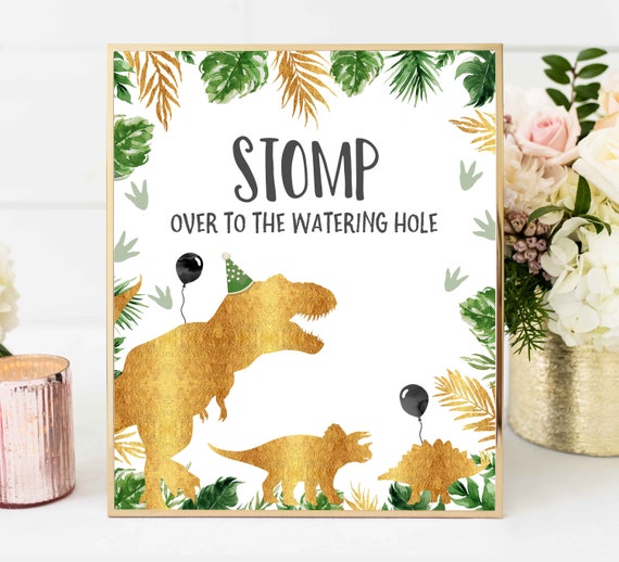 Stomp Over To The Watering Hole Sign Gold Dinosaur Table Sign Jungle Dino Party T Rex Birthday Dinosaur Birthday Instant Download Sign 15 By Pixel Perfection Party Ltd Catch My Party Stomp Over To The Watering Hole Sign Gold Dinosaur Table Sign Jungle Dino Party T Rex Birthday Dinosaur Birthday Instant Download Sign 15 By Pixel Perfection Party Ltd Catch My Party