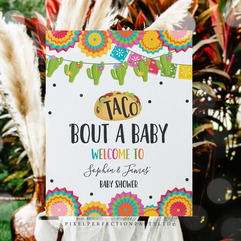 May include: A white sign with colorful Mexican-themed decorations, a taco graphic, and the text "Taco Bout A Baby, Welcome to Sophia & James' Baby Shower".