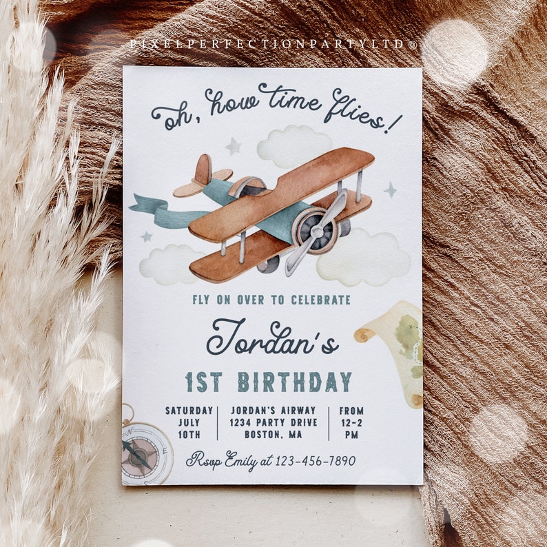 May include: A white invitation with a blue and brown airplane illustration. The text reads "Oh, how time flies!" and "Fly on over to celebrate Jordan's 1st Birthday". The invitation includes details for the party, including the date, time, location, and RSVP information.